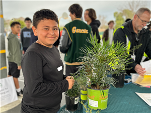 Photo 2: MASA student explores the plant station